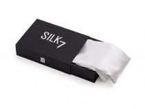 white silk pillowcase in a black box